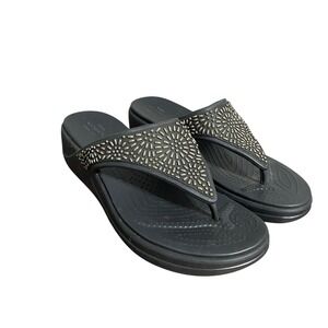 CROCS Black Wedge Flip Sandals with Gold Stud Detailing